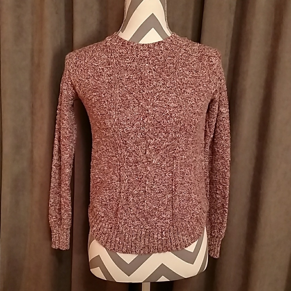 Red high neck sweater.